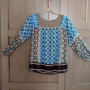 Blouse with funky shapes on it